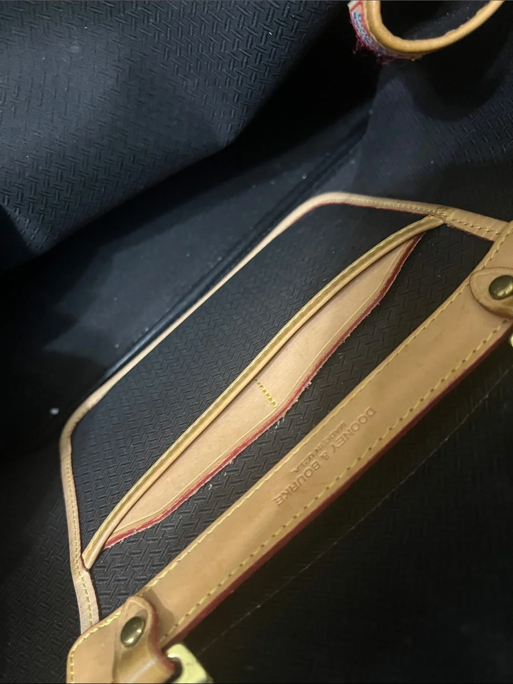 Dooney & Bourke Black and Tan Satchel with Gold Hardware